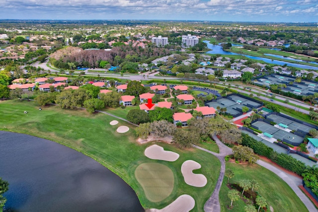 aerial view with a water view, a residential view, and golf course view