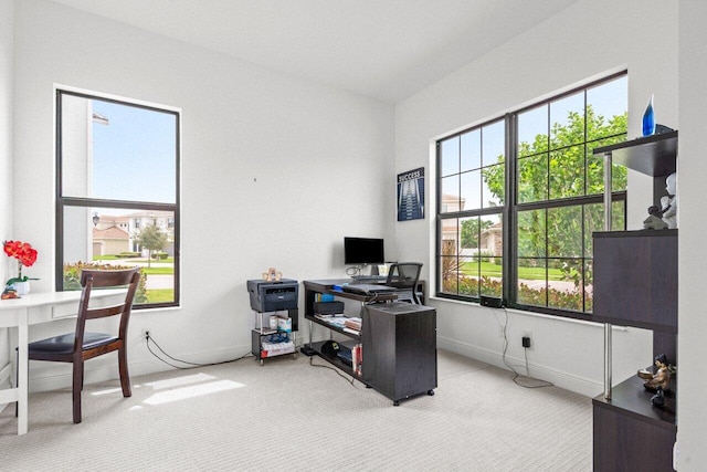 office featuring carpet floors and baseboards