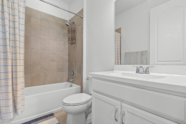 bathroom featuring shower / tub combo with curtain, vanity, and toilet