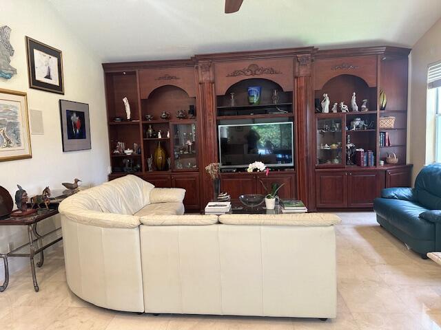 3271 Harrington Dr, Boca Raton, FL 33496 - living area featuring a ceiling fan and light tile patterned floors