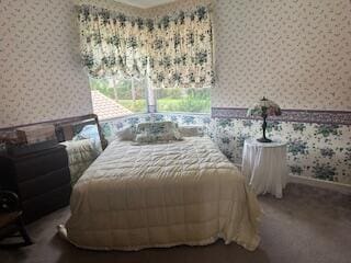 3271 Harrington Dr, Boca Raton, FL 33496 - carpeted bedroom with wallpapered walls and baseboards
