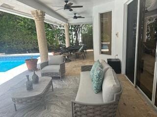 3271 Harrington Dr, Boca Raton, FL 33496 - view of patio / terrace with an outdoor hangout area, ceiling fan, and an outdoor pool