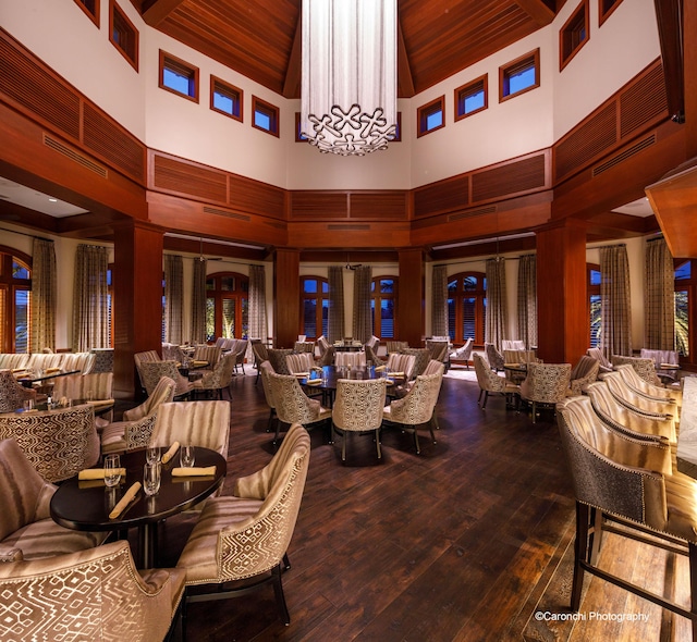 3271 Harrington Dr, Boca Raton, FL 33496 - building lobby with a towering ceiling, wood ceiling, and wood walls