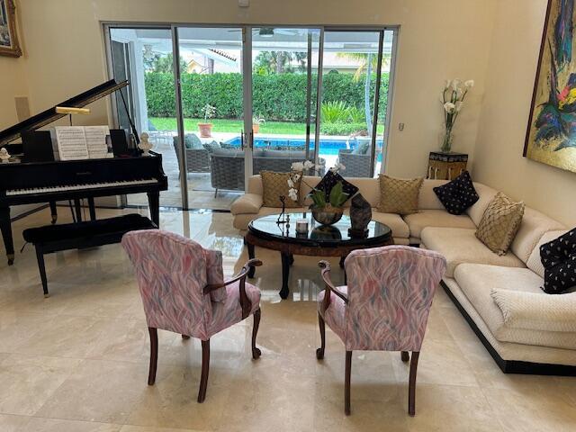 3271 Harrington Dr, Boca Raton, FL 33496 - living area featuring healthy amount of natural light