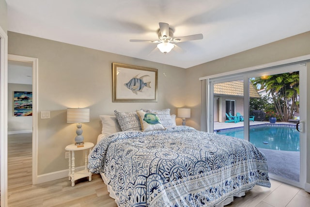 bedroom with a ceiling fan, access to outside, baseboards, and wood finished floors