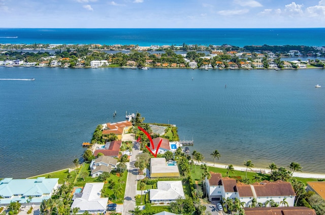 birds eye view of property featuring a residential view and a water view