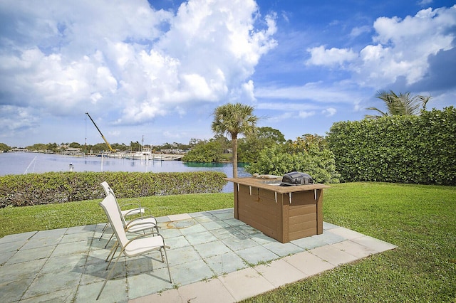 view of patio featuring a water view