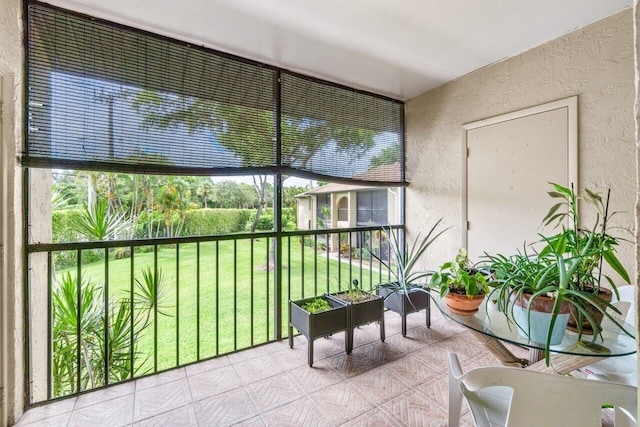 sunroom with plenty of natural light