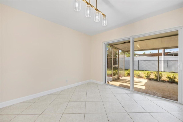 514 Jaeger Dr, Delray Beach, FL 33444 - spare room with baseboards and light tile patterned floors