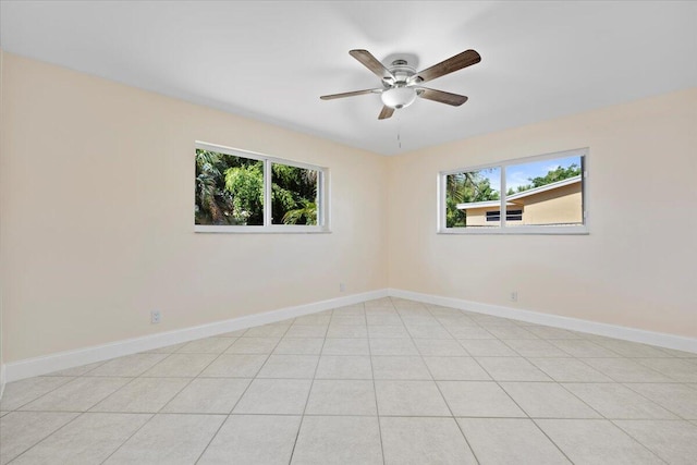 514 Jaeger Dr, Delray Beach, FL 33444 - unfurnished room with plenty of natural light, a ceiling fan, and baseboards