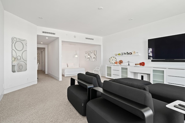 living room featuring baseboards and light colored carpet