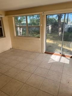 interior space featuring tile patterned flooring