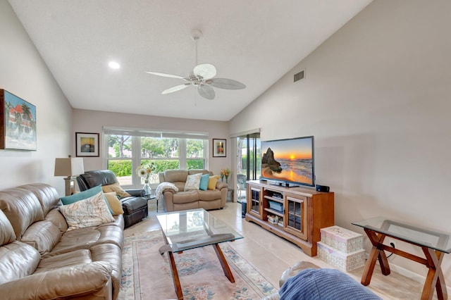 living area featuring visible vents, baseboards, ceiling fan, high vaulted ceiling, and light tile patterned flooring