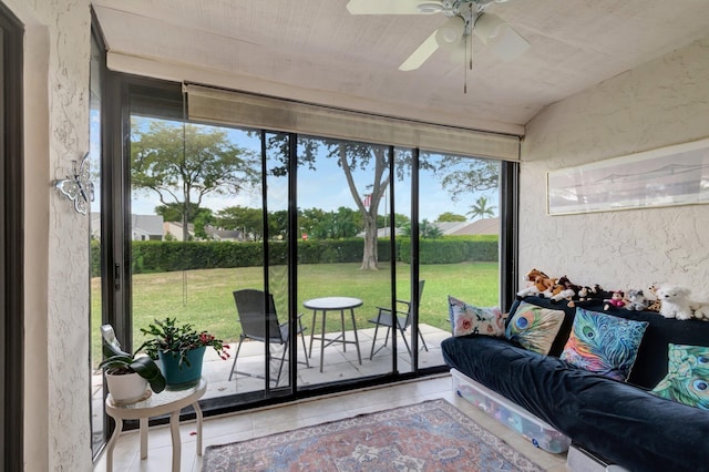 sunroom / solarium with ceiling fan