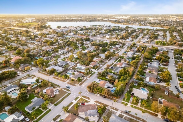 aerial view featuring a water view and a residential view