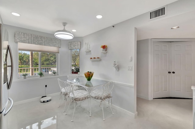 dining area featuring baseboards, visible vents, and recessed lighting