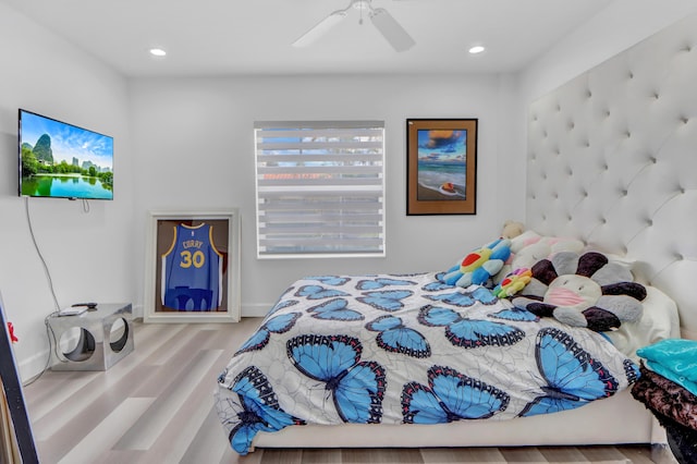 bedroom featuring a ceiling fan, wood finished floors, and recessed lighting