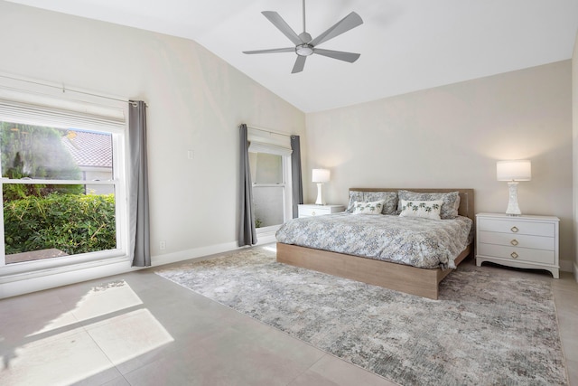 tiled bedroom featuring vaulted ceiling, baseboards, and ceiling fan