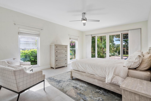 bedroom with baseboards and ceiling fan