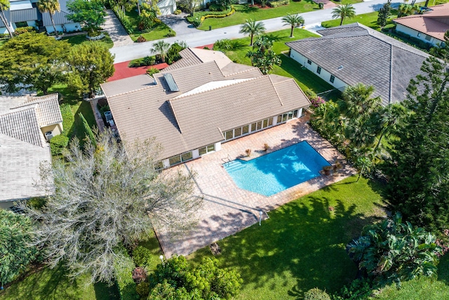 birds eye view of property with a residential view