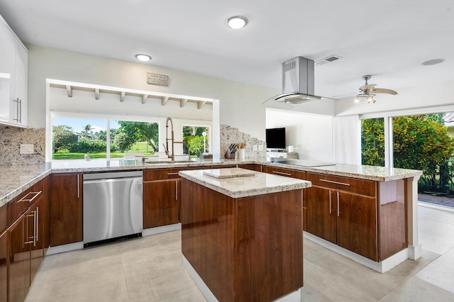 kitchen with visible vents, a sink, a center island, ventilation hood, and dishwasher