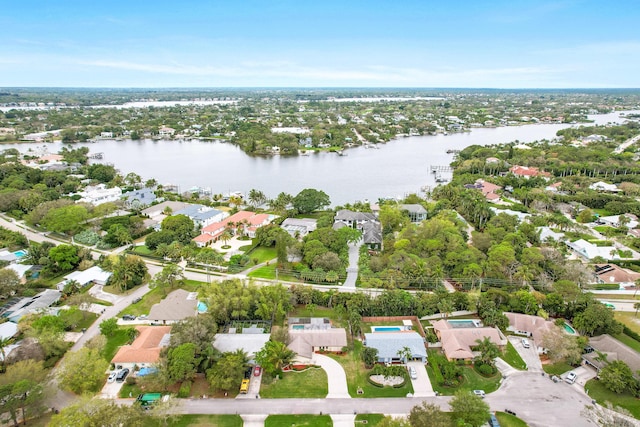 bird's eye view with a water view and a residential view