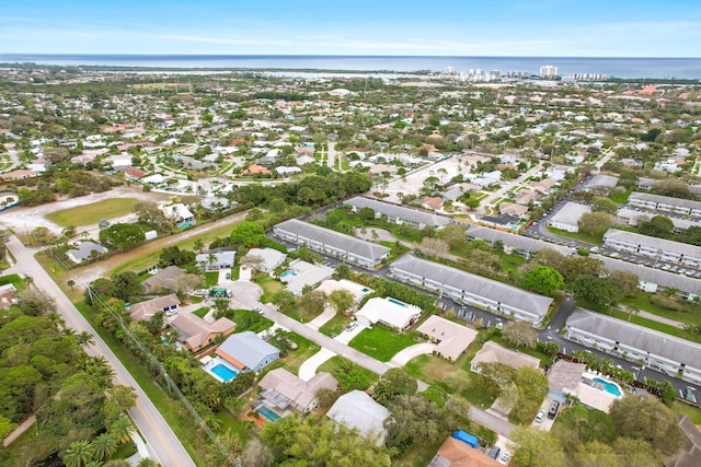 aerial view featuring a water view and a residential view