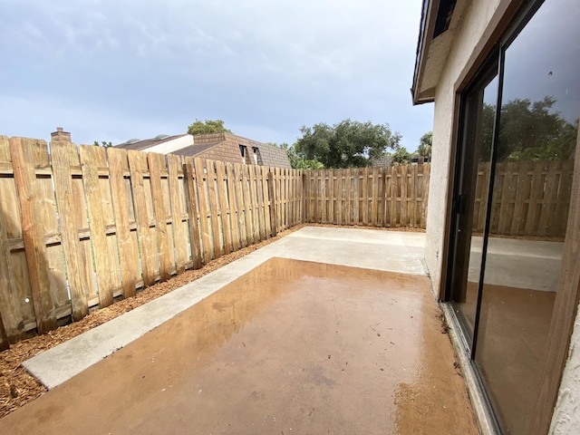 view of patio featuring a fenced backyard