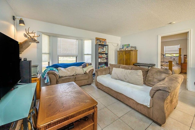 living room featuring a textured ceiling