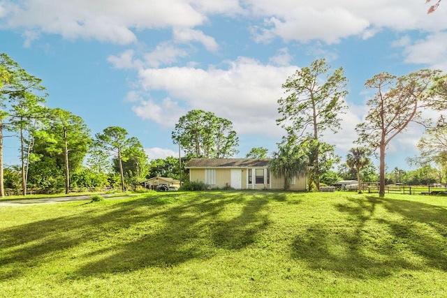 view of yard with fence