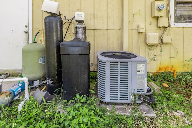 details featuring central air condition unit and electric meter