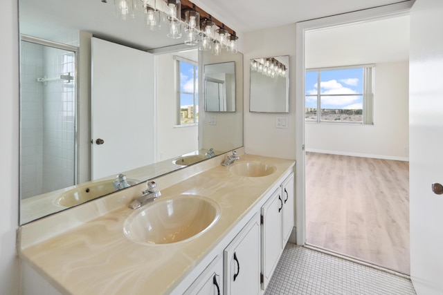 full bath featuring double vanity and a sink