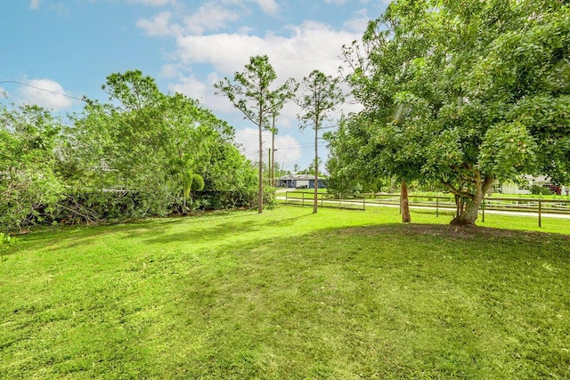 view of yard with fence