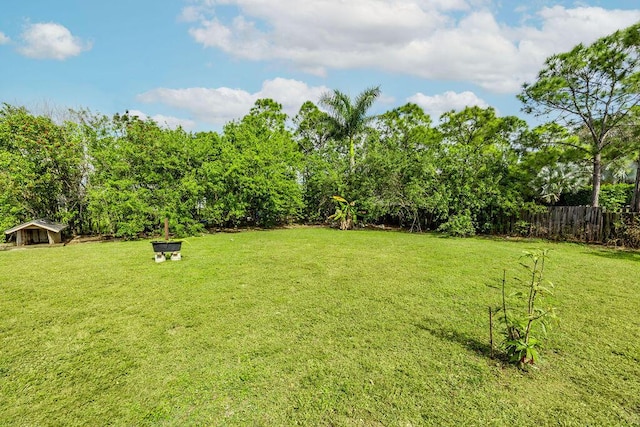 view of yard with fence