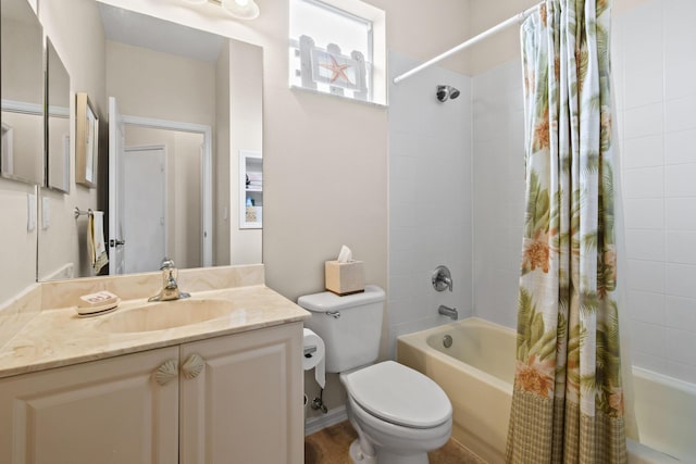 bathroom with vanity, toilet, and shower / tub combo with curtain