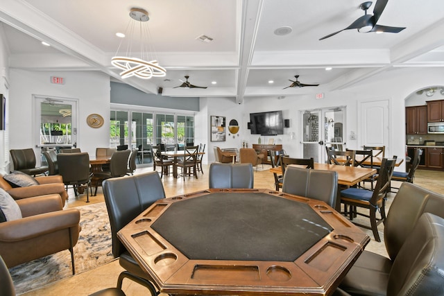 playroom featuring coffered ceiling, a ceiling fan, and beamed ceiling