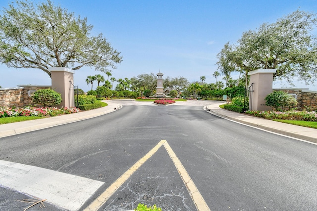 view of road with curbs and sidewalks