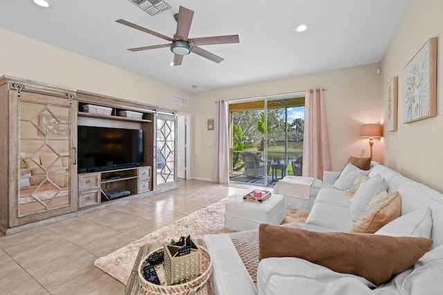 living room with recessed lighting, visible vents, a ceiling fan, and light tile patterned flooring