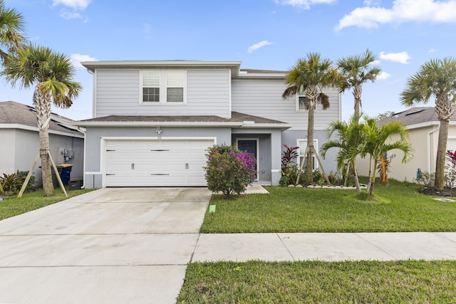 view of front of home with a garage, stucco siding, driveway, and a front lawn