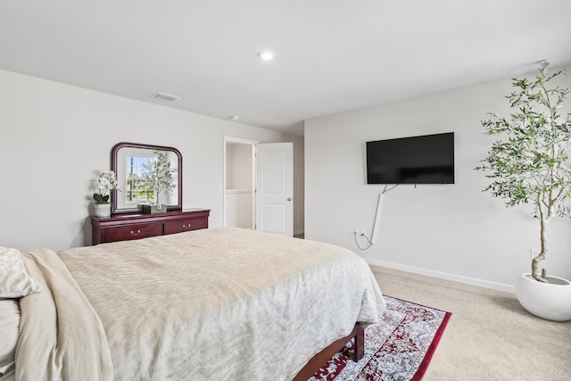 carpeted bedroom featuring recessed lighting, visible vents, and baseboards