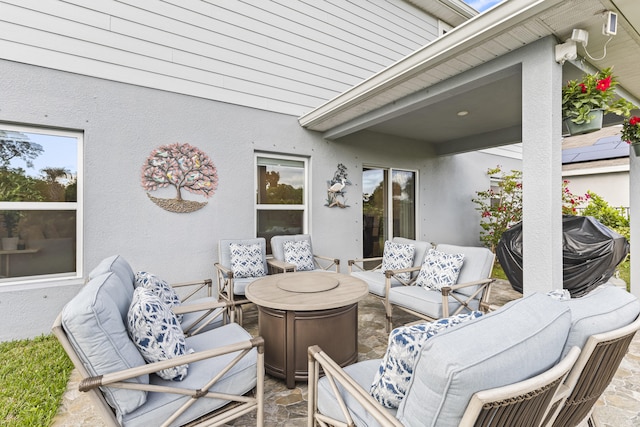 view of patio with an outdoor hangout area and area for grilling