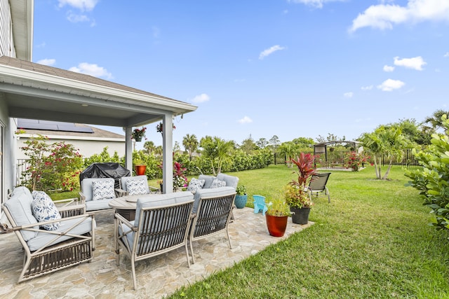 exterior space with outdoor lounge area and area for grilling