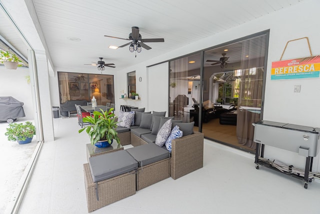 view of patio featuring outdoor dining area, outdoor lounge area, a grill, and a ceiling fan