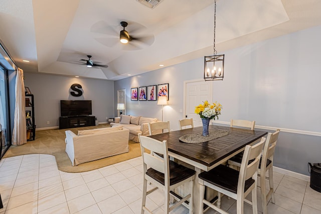 dining space with visible vents, baseboards, a raised ceiling, light tile patterned flooring, and recessed lighting