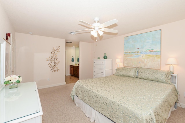 bedroom with light carpet, baseboards, and a ceiling fan