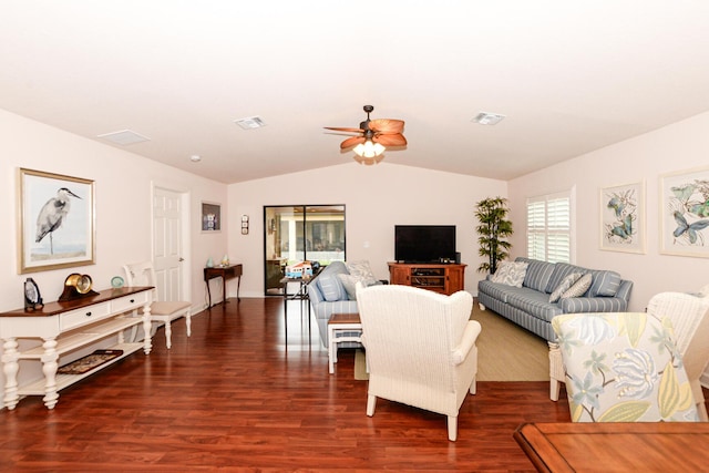 living room featuring visible vents, vaulted ceiling, and dark wood-type flooring