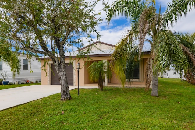 single story home with a front yard, driveway, an attached garage, and stucco siding