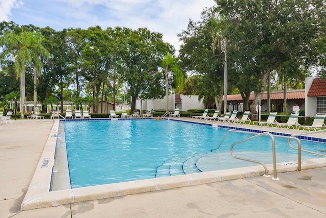 pool with a patio area