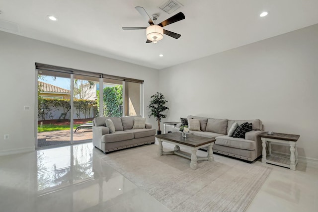 living room featuring a ceiling fan, recessed lighting, and visible vents