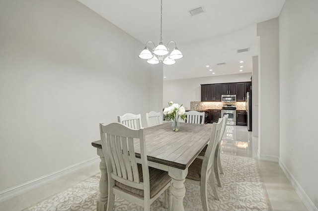 dining area with baseboards, recessed lighting, visible vents, and a notable chandelier